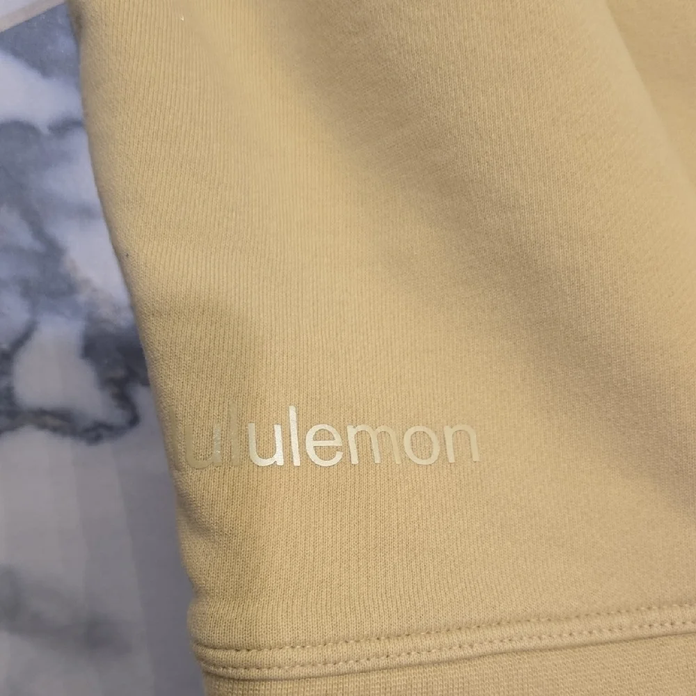 lululemon athletica vuori yellow logo